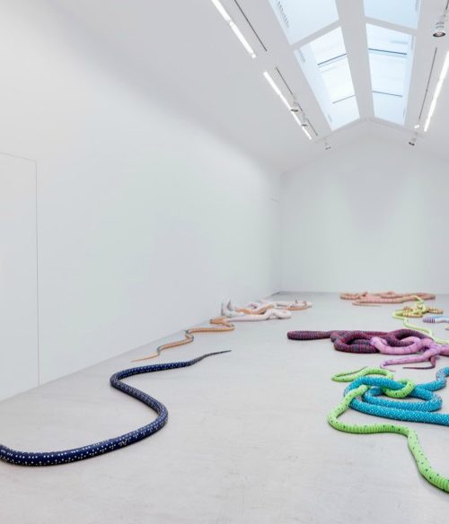 knitted snake art installation
